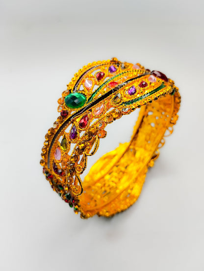 Gold plated Kara with multicoloured nugs work